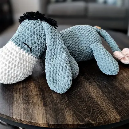 Eeyore seated against a neutral background