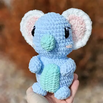 Koazy the Koala sitting upright, front view