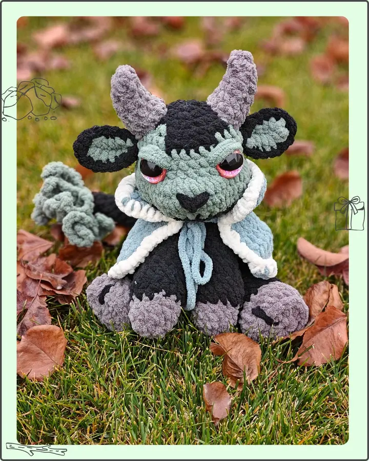 Nacht the Krampus, a crocheted Krampus figure with dark fur, curled horns and a long red tongue