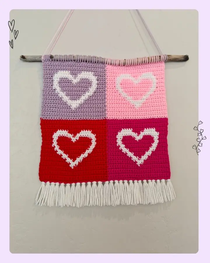 Colorful retro-inspired crocheted hanging hearts made with tapestry crochet