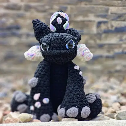 Vexley held in one hand to show scale